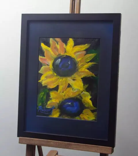 A vibrant acrylic painting with bold yellow petals, blue centers, and dynamic brushstrokes.