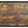 A framed abstract print with vibrant, interwoven lines resembling a Pollock-style composition. Dominant hues of yellow, red, purple, and brown create dynamic movement against a textured dark background.
